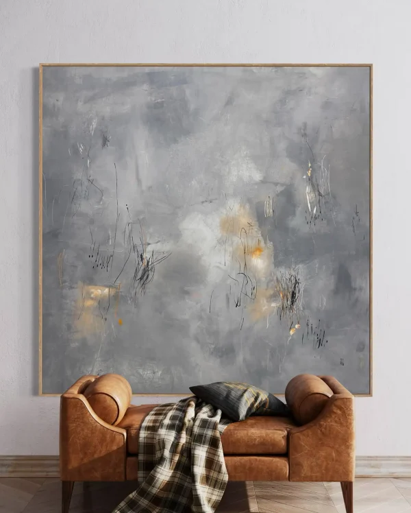 Large modern abstract expressionist painting "Nostalgia" by Australian artist Pez, showcasing a minimalist textured gray color palette with sub-surface gold glows, perfect for luxury residential staging or corporate interior architecture projects.