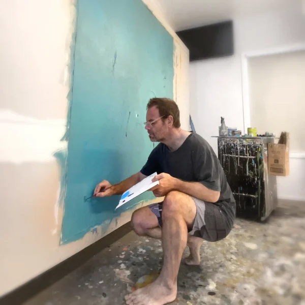 Large square blue abstract painting by PEZ in his studio.
