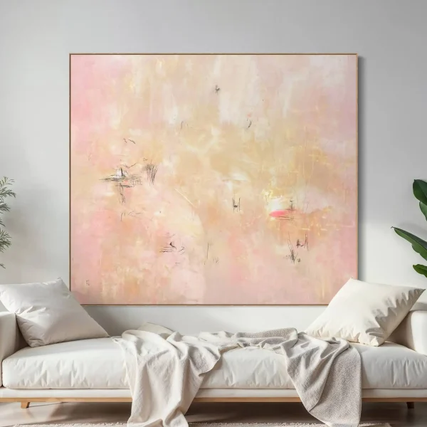 Large contemporary pink abstract painting styled as a statement feature artwork on a modern luxury living room wall.