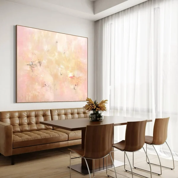 Large contemporary pink abstract painting styled as a statement feature artwork on a modern luxury living room wall.